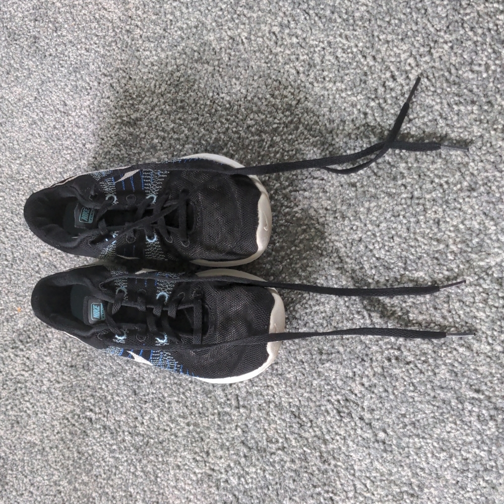 Blue and black Nike sneakers